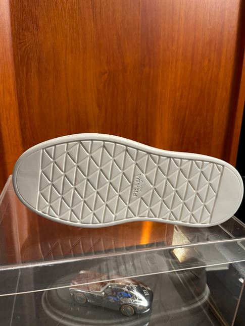 PRADA MACRO RE-NYLON AND BRUSHED LEATHER SNEAKERS – PRS056