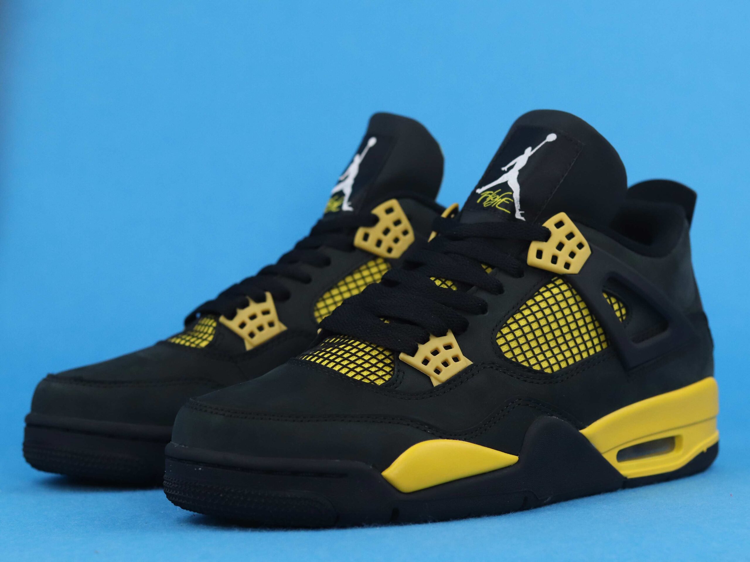 Air Jordan 4 Retro Thunder Yellow