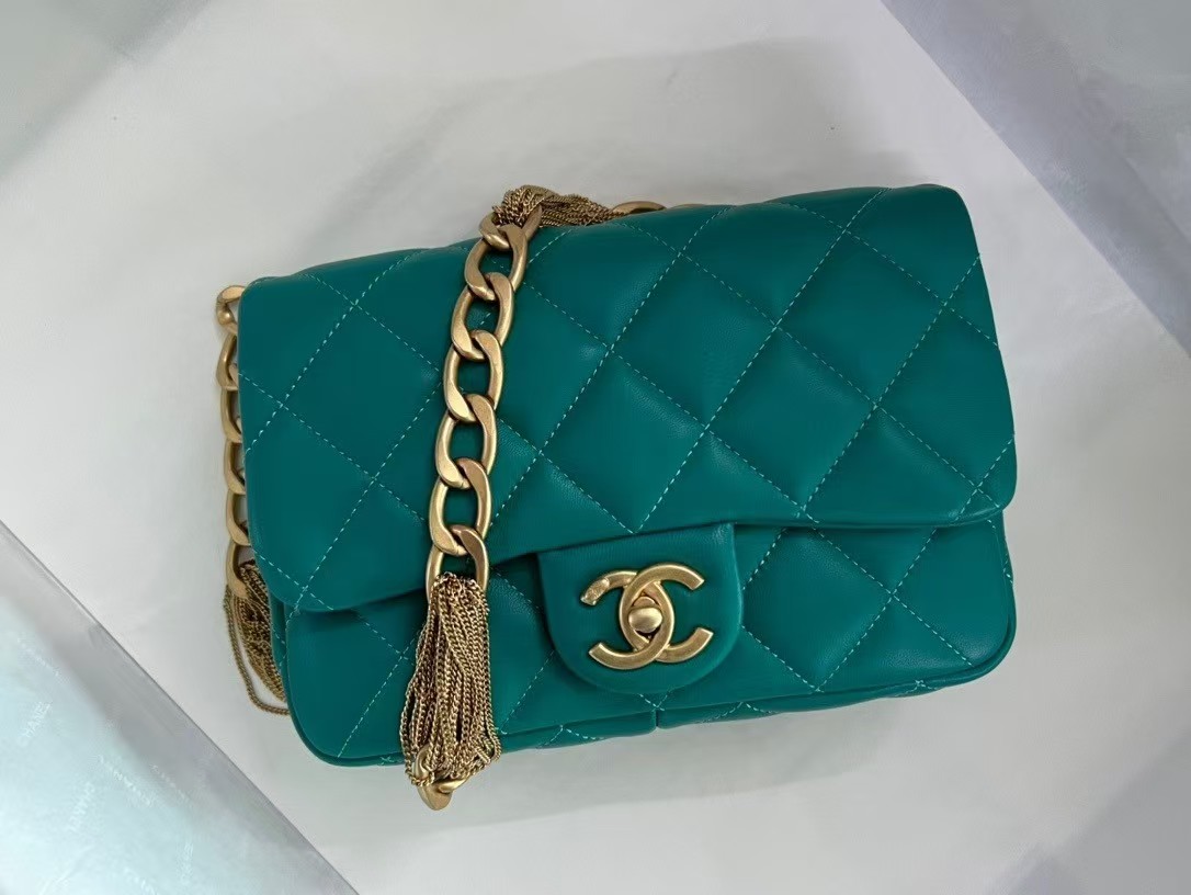 gold button engraved bag