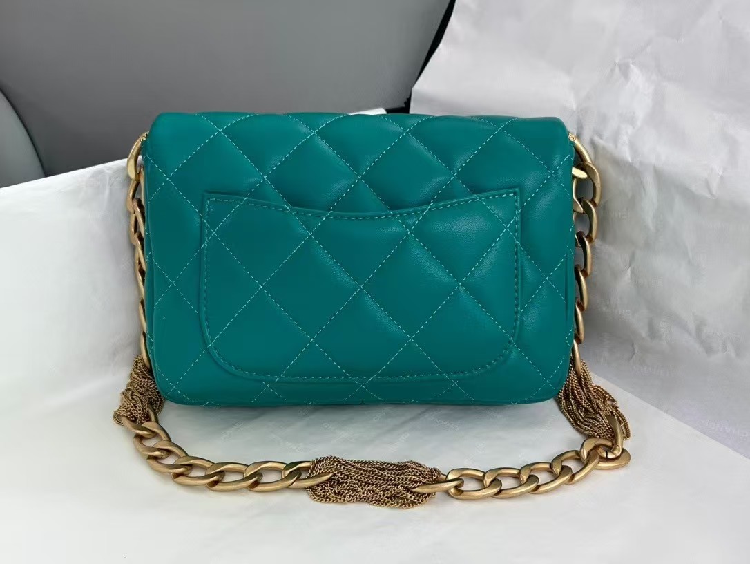 gold button engraved bag