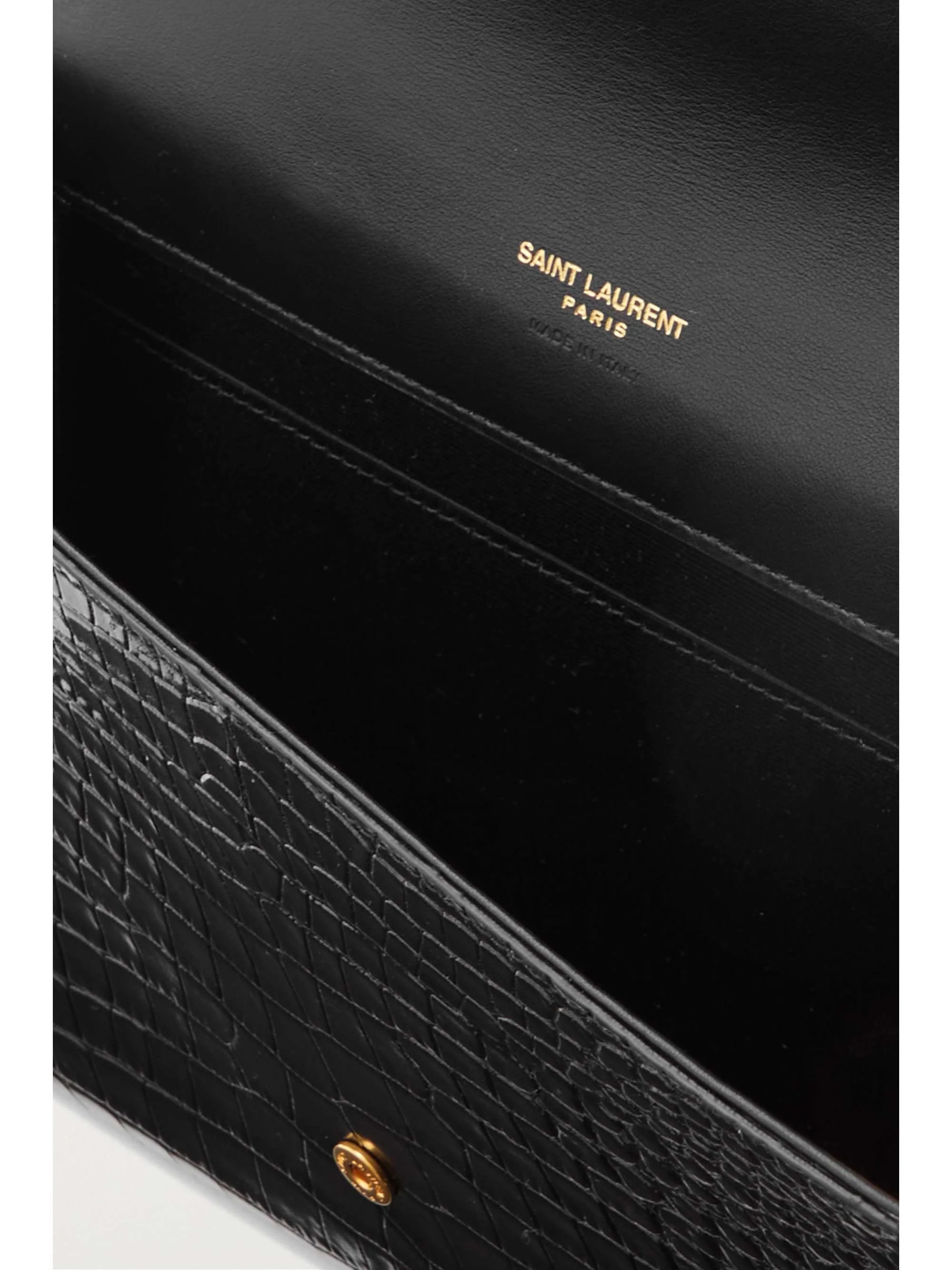 Shiny croc-effect leather clutch