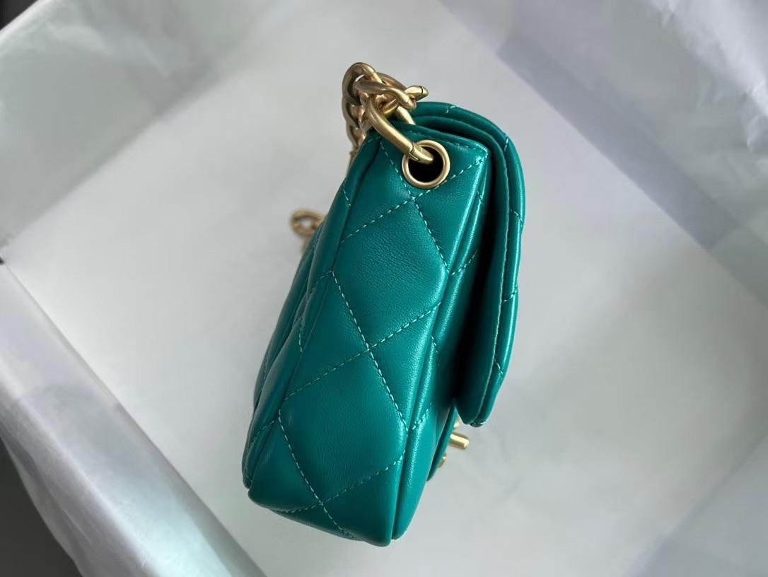 gold button engraved bag