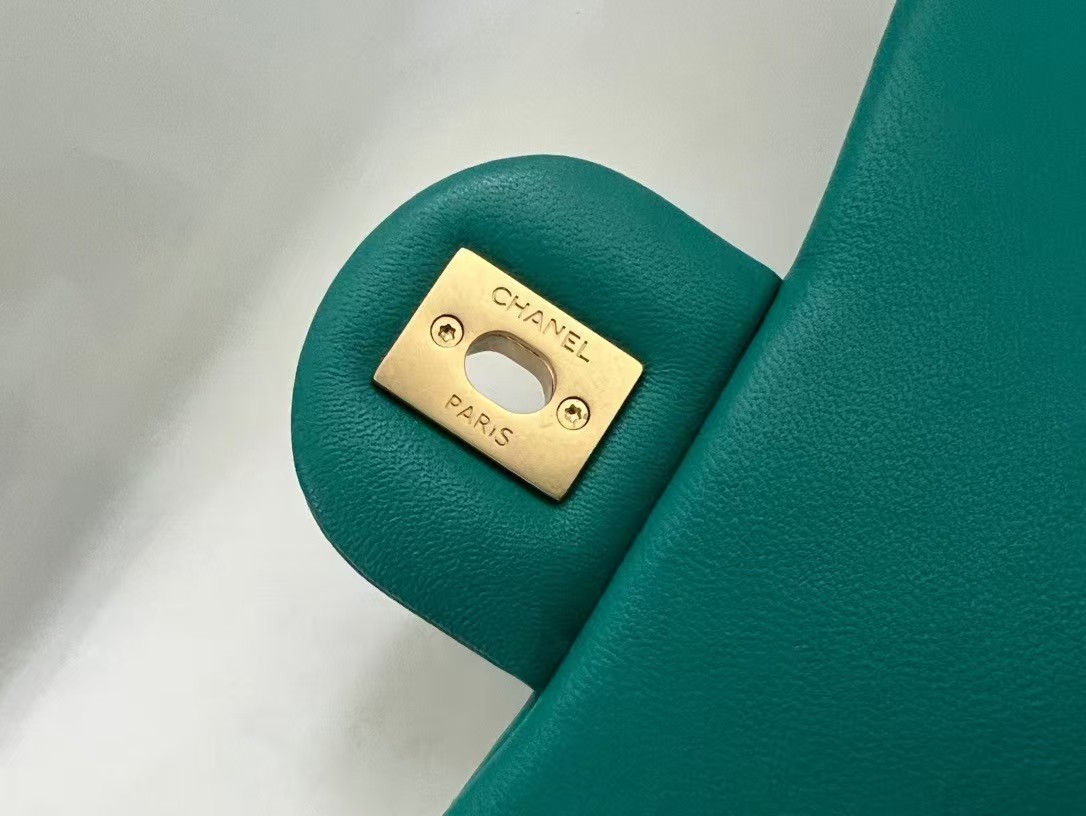 gold button engraved bag