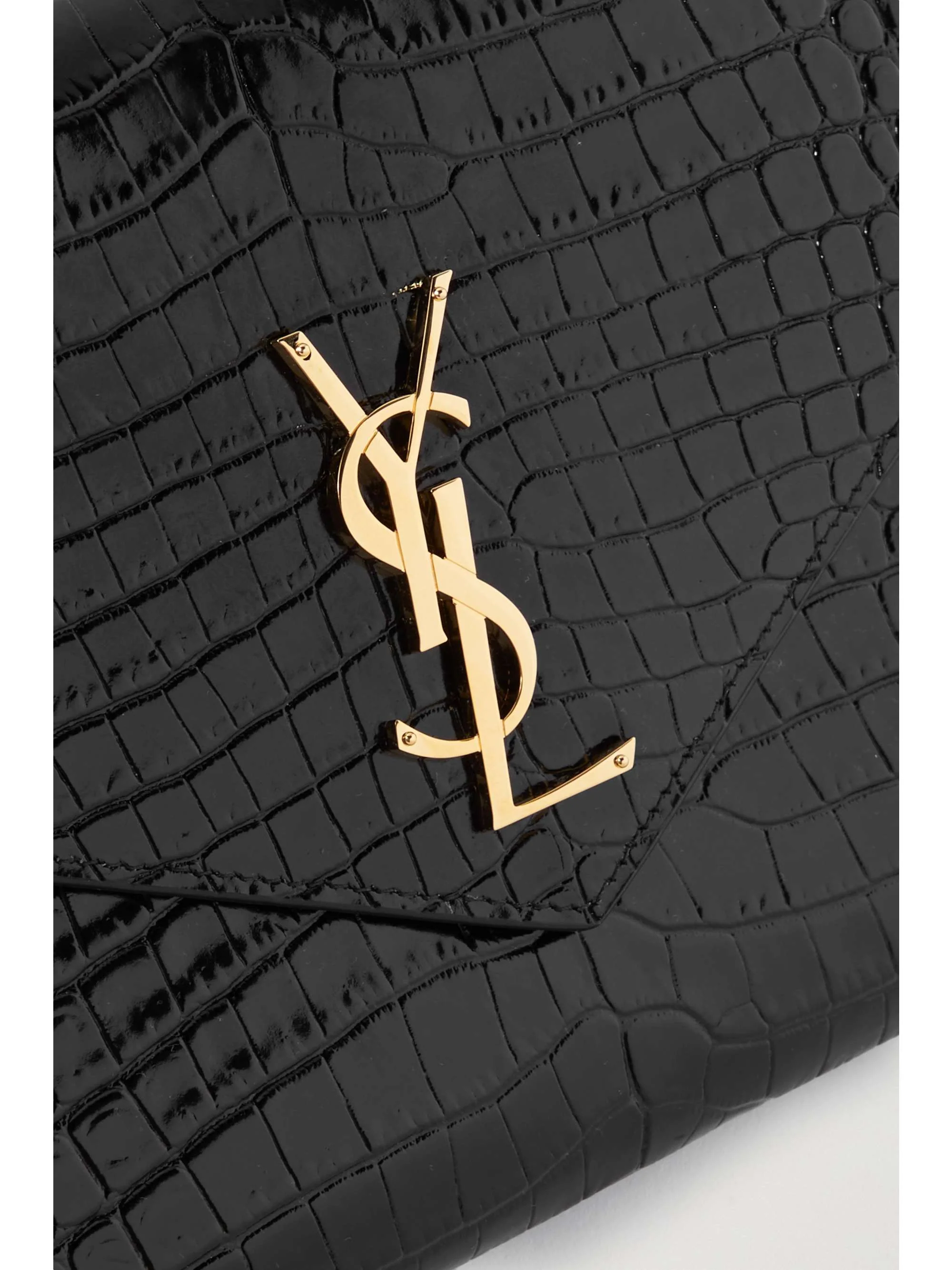 Shiny croc-effect leather clutch