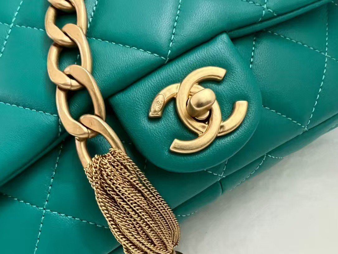 gold button engraved bag