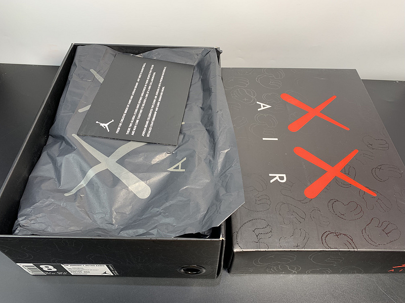 KAWS x Air Jordan 4 Cool Grey 930155-003