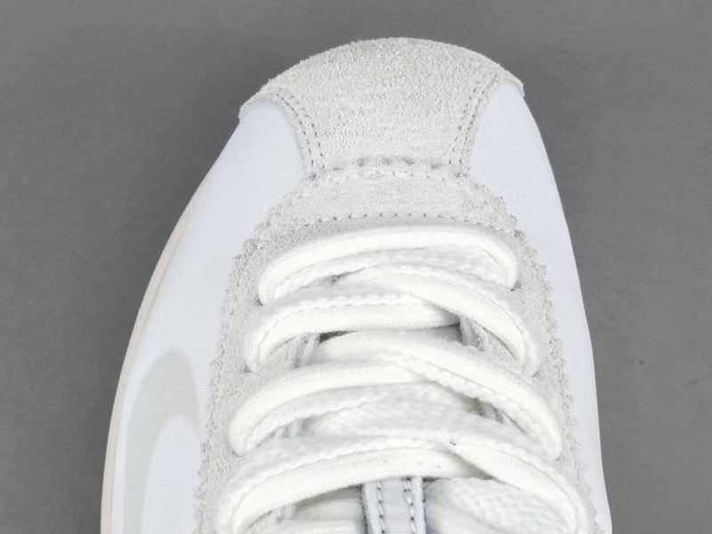 Sacai x Nike Cortez 4.0 DQ0581-100