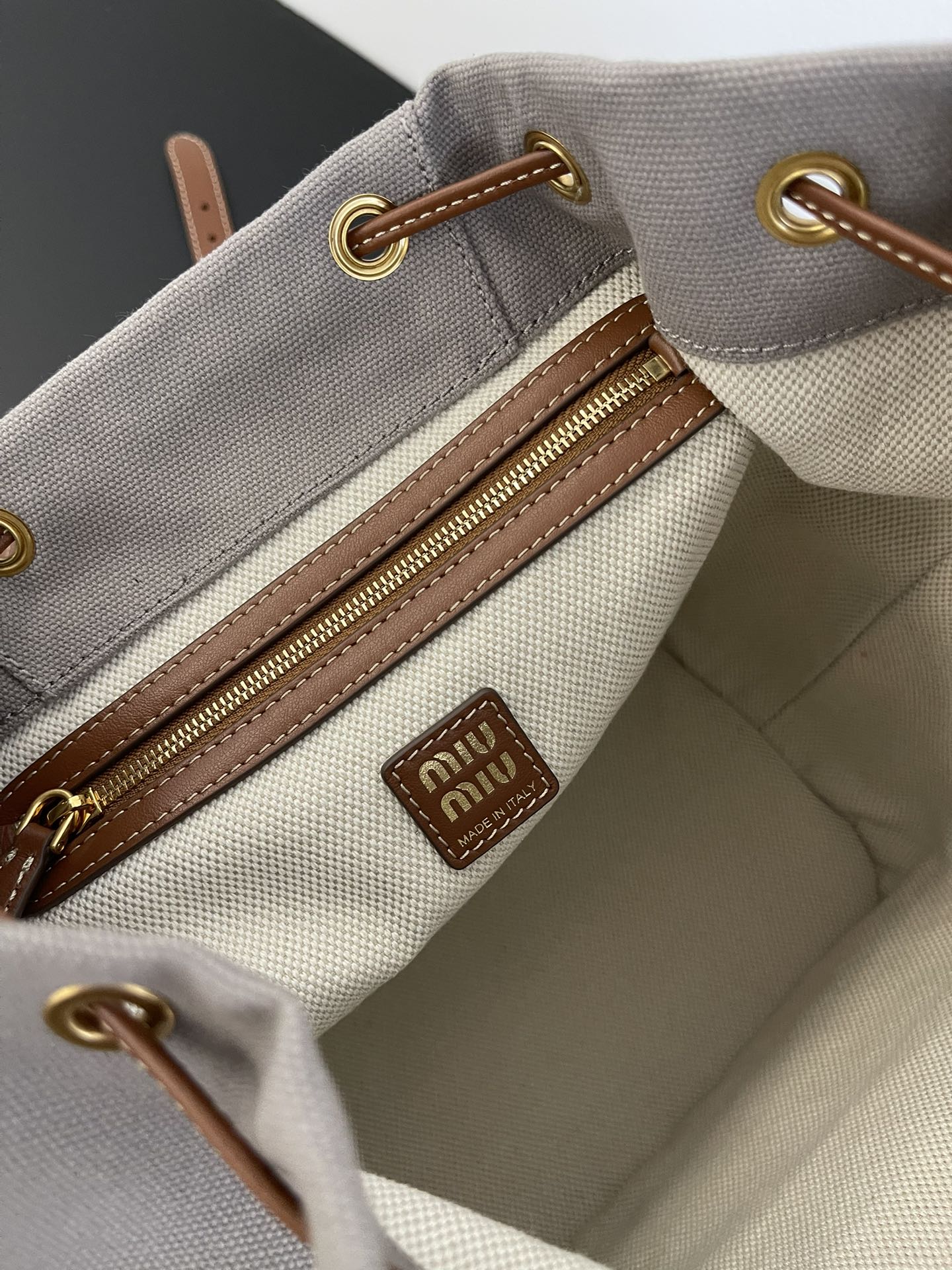 MiuMi* 25SS Canvas Backpack(29.5*25*12.5 CM）