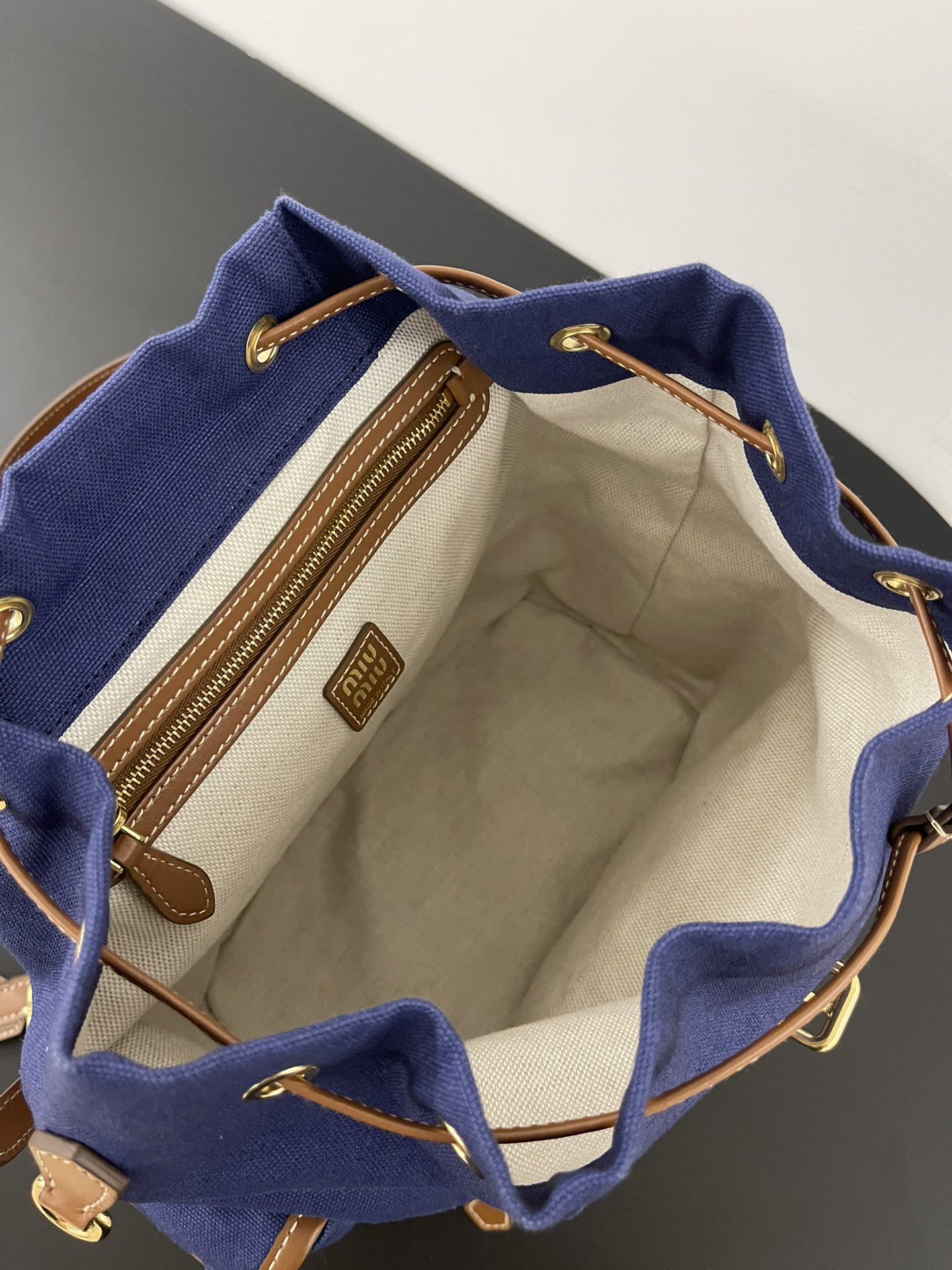 MiuMi* 25SS Canvas Backpack(29.5*25*12.5 CM）