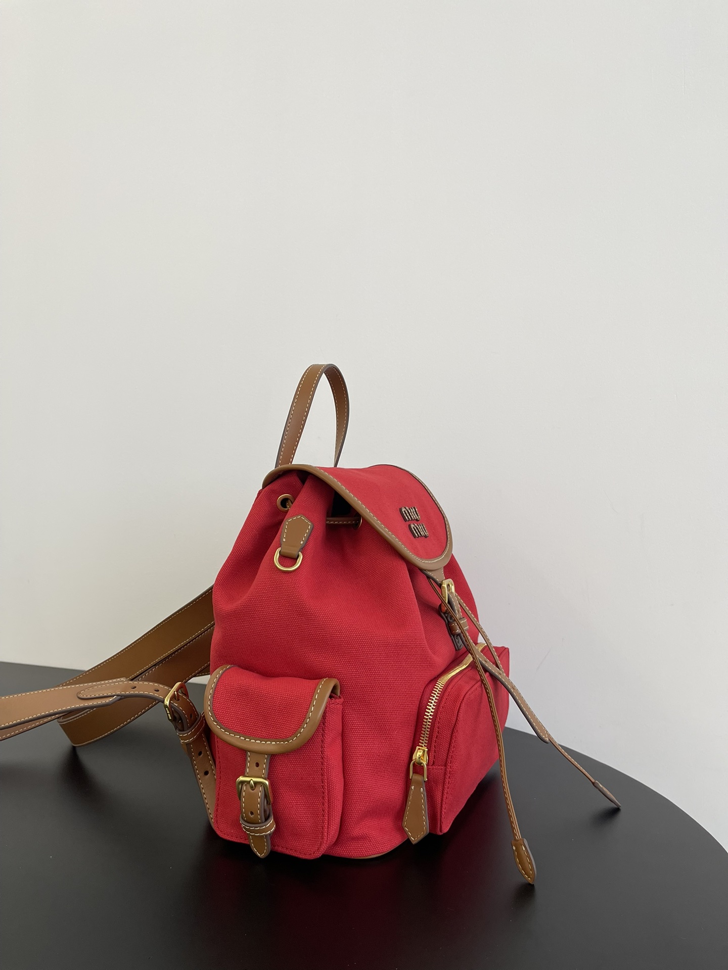 MiuMi* 25SS Canvas Backpack(29.5*25*12.5 CM）