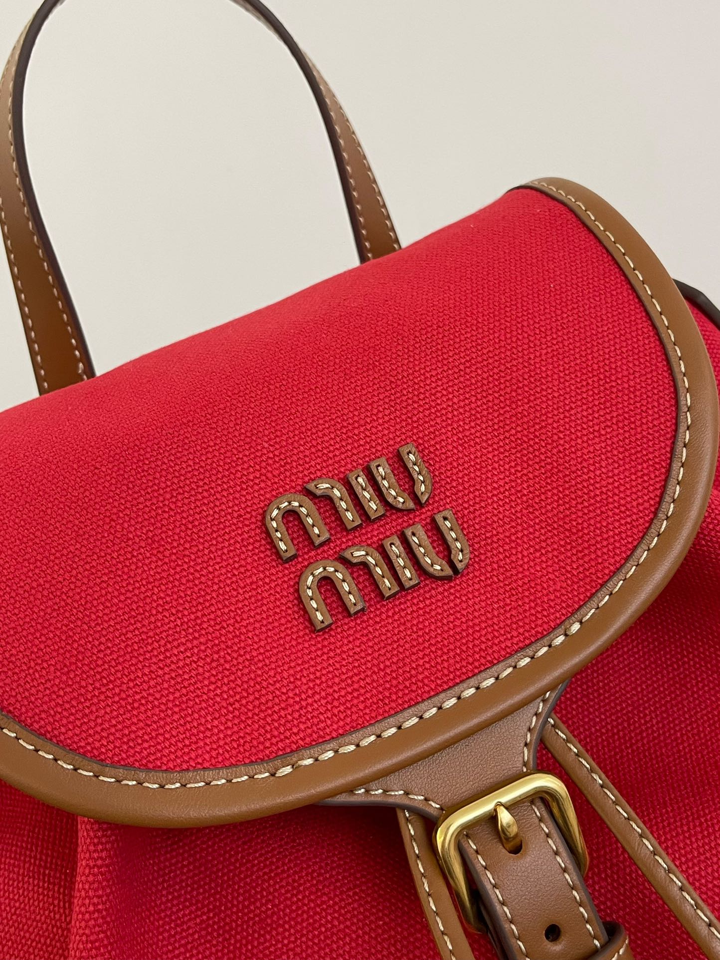 MiuMi* 25SS Canvas Backpack(29.5*25*12.5 CM）