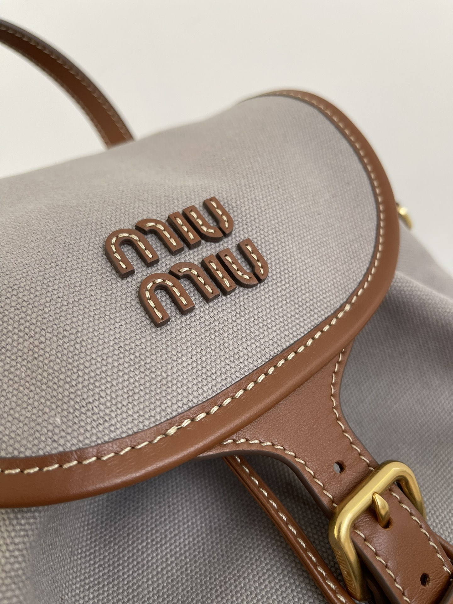 MiuMi* 25SS Canvas Backpack(29.5*25*12.5 CM）