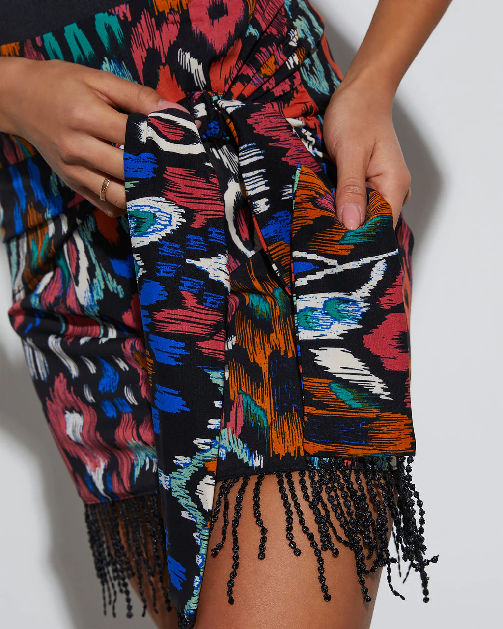 Isla Wrap Fringe Hem Mini Skirt
