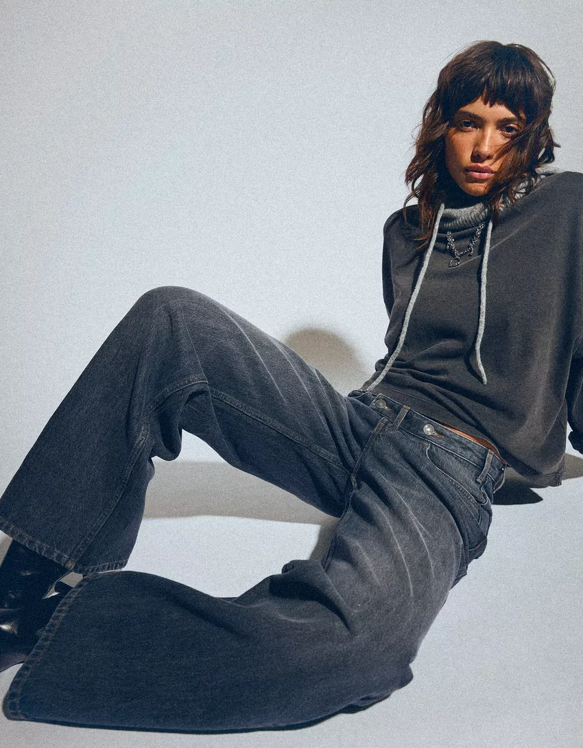 Wide leg jeans with crossover waistband