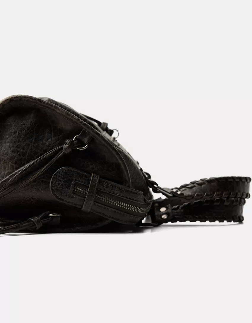 Worn-effect bowling bag with straps