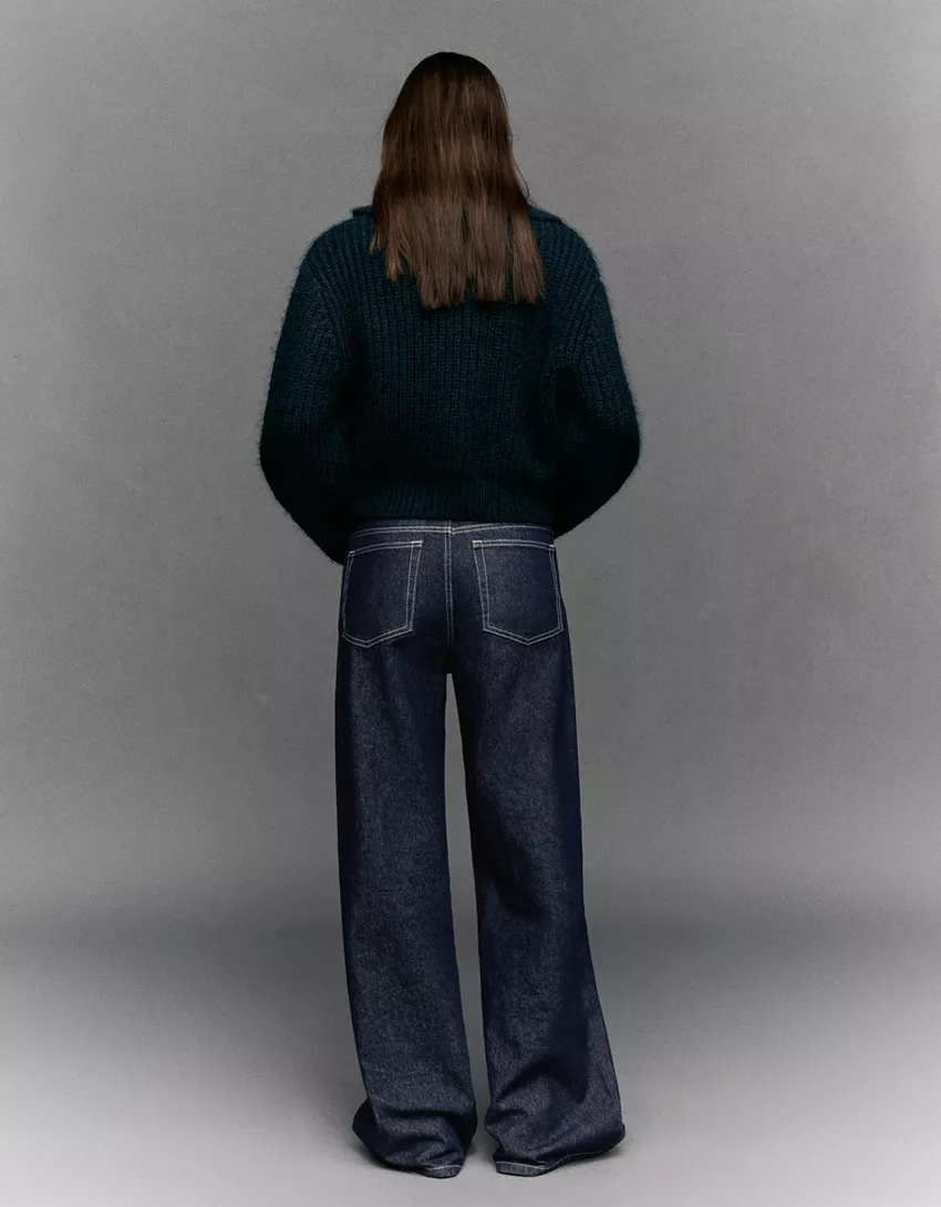 Wide leg jeans with crossover waistband