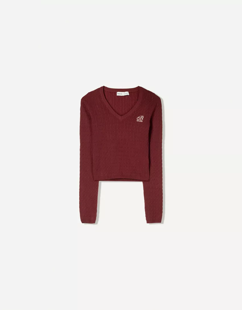 Cable-knit sweater with embroidery