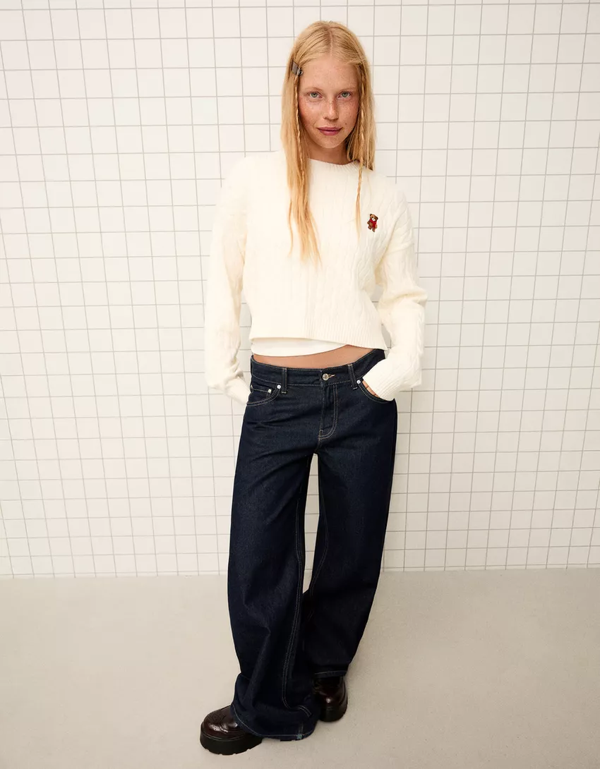 Cable-knit sweater with embroidery