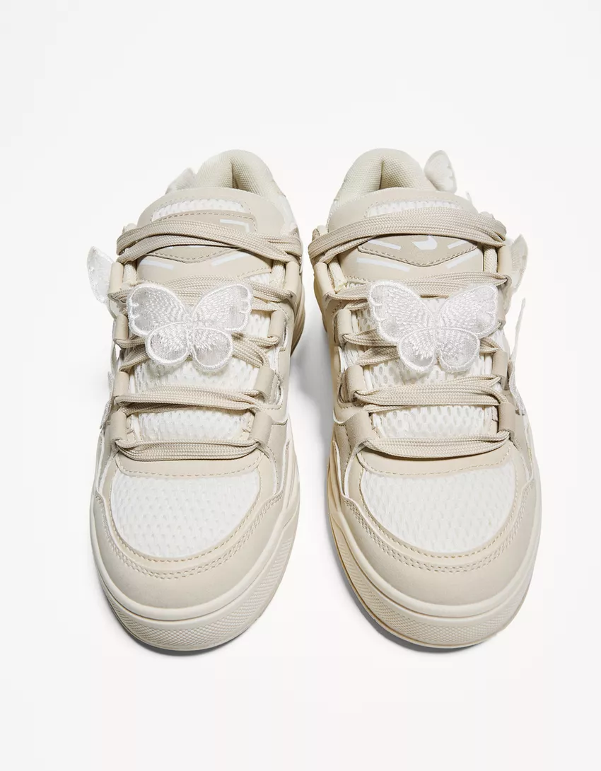 Skater sneakers with butterfly details
