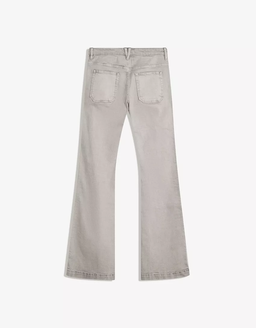 Flared pants with pocket flaps