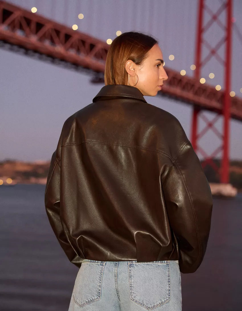 Belted leather effect bomber jacket