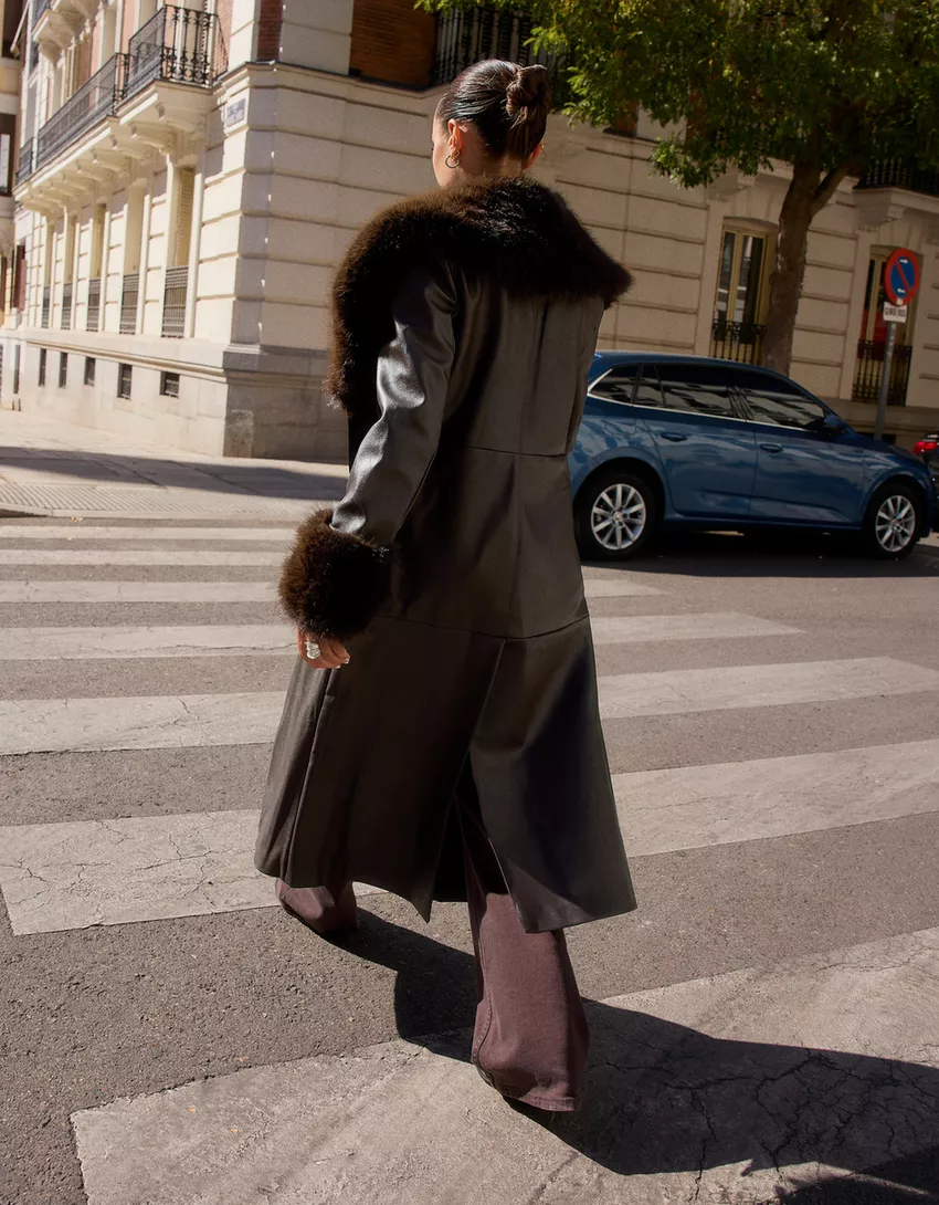 Contrast leather effect coat with faux fur