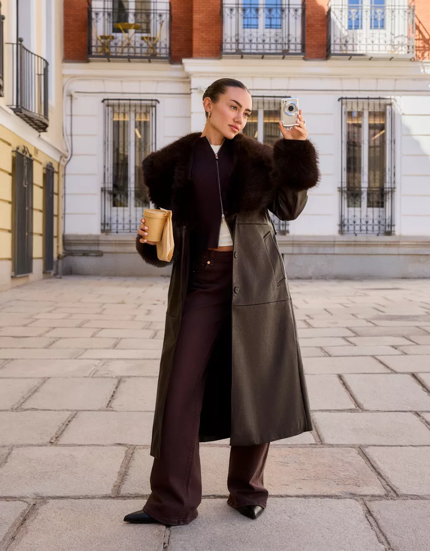 Contrast leather effect coat with faux fur