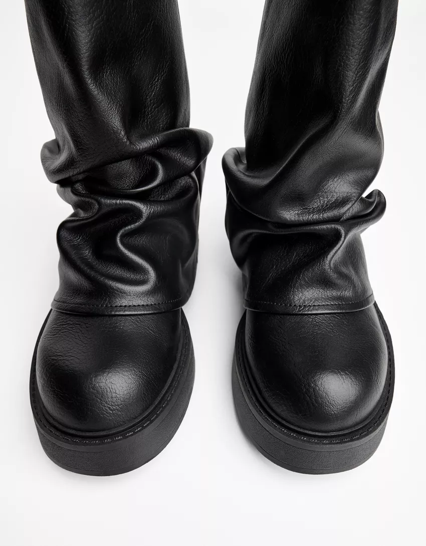 Flat fold over ankle boots with buckle