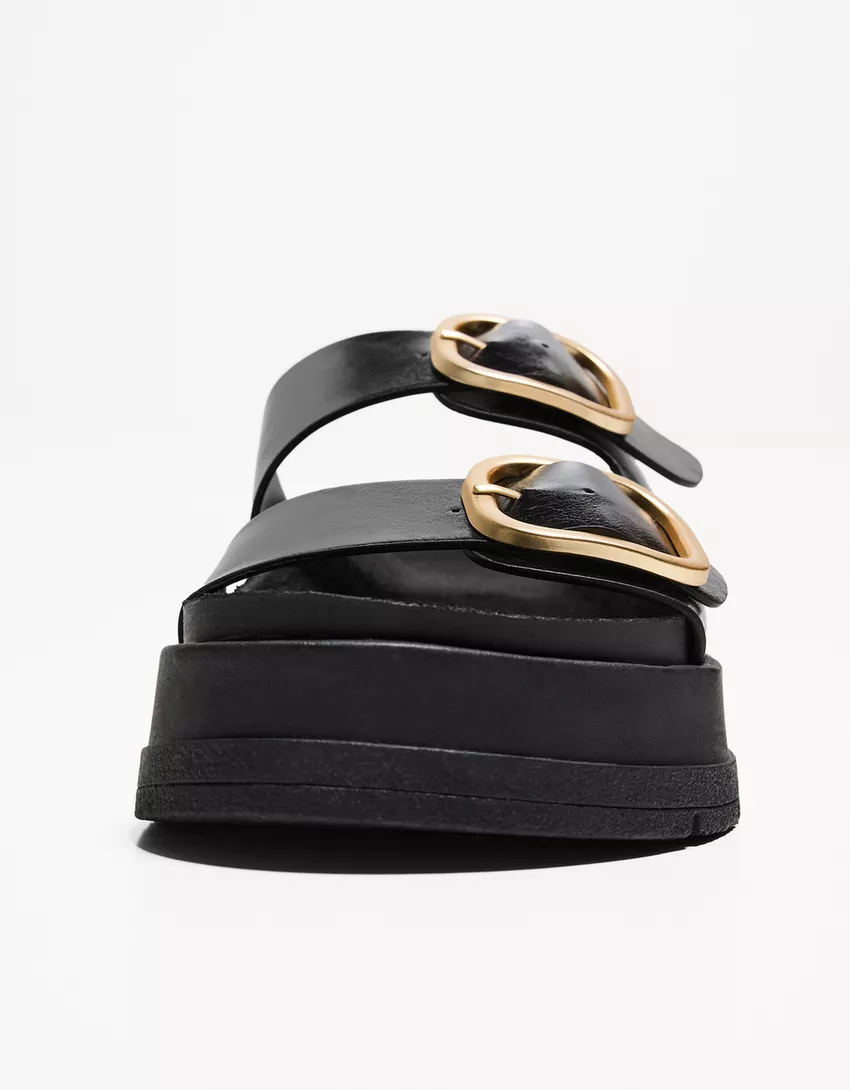 Flat platform sandals with buckles