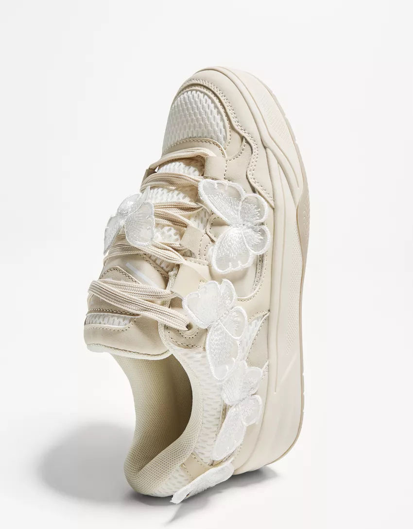 Skater sneakers with butterfly details