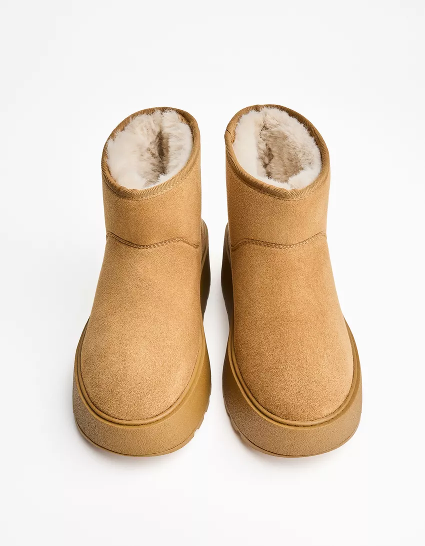 Platform ankle boots with faux fur lining