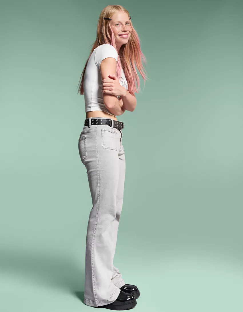 Flared pants with pocket flaps