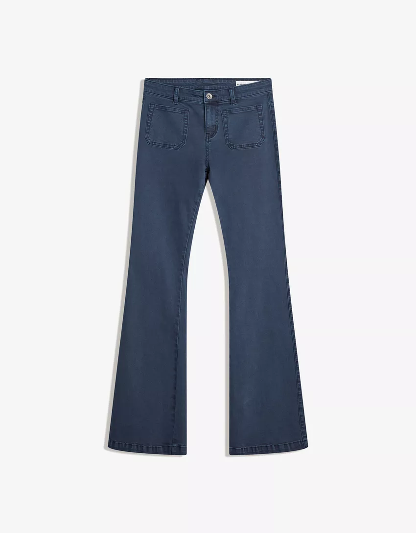 Flared pants with pocket flaps