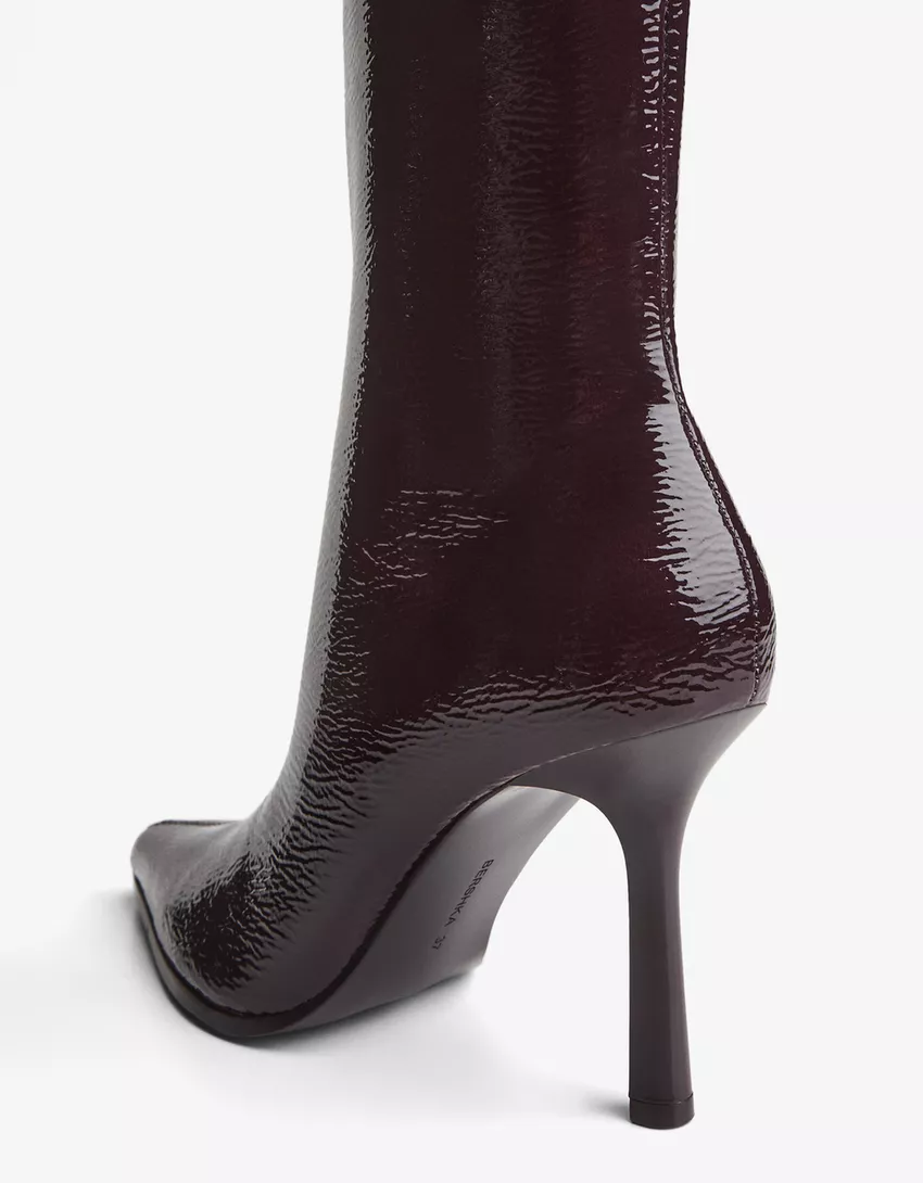 Engraved heel ankle boot