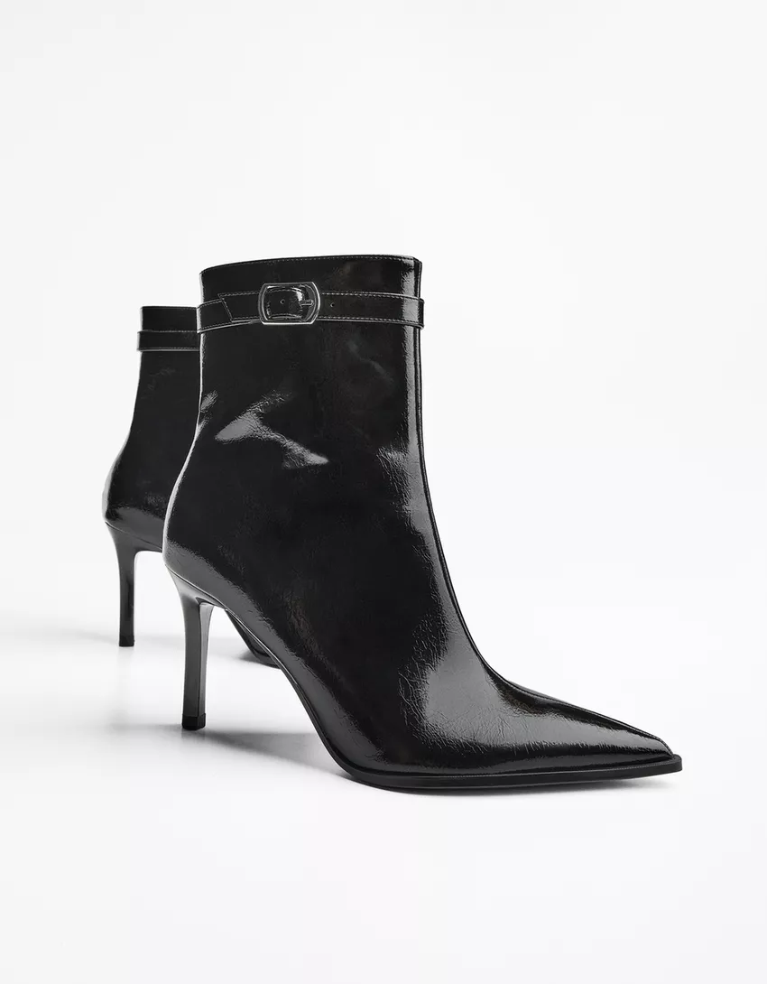 Heeled ankle boot with buckle strap
