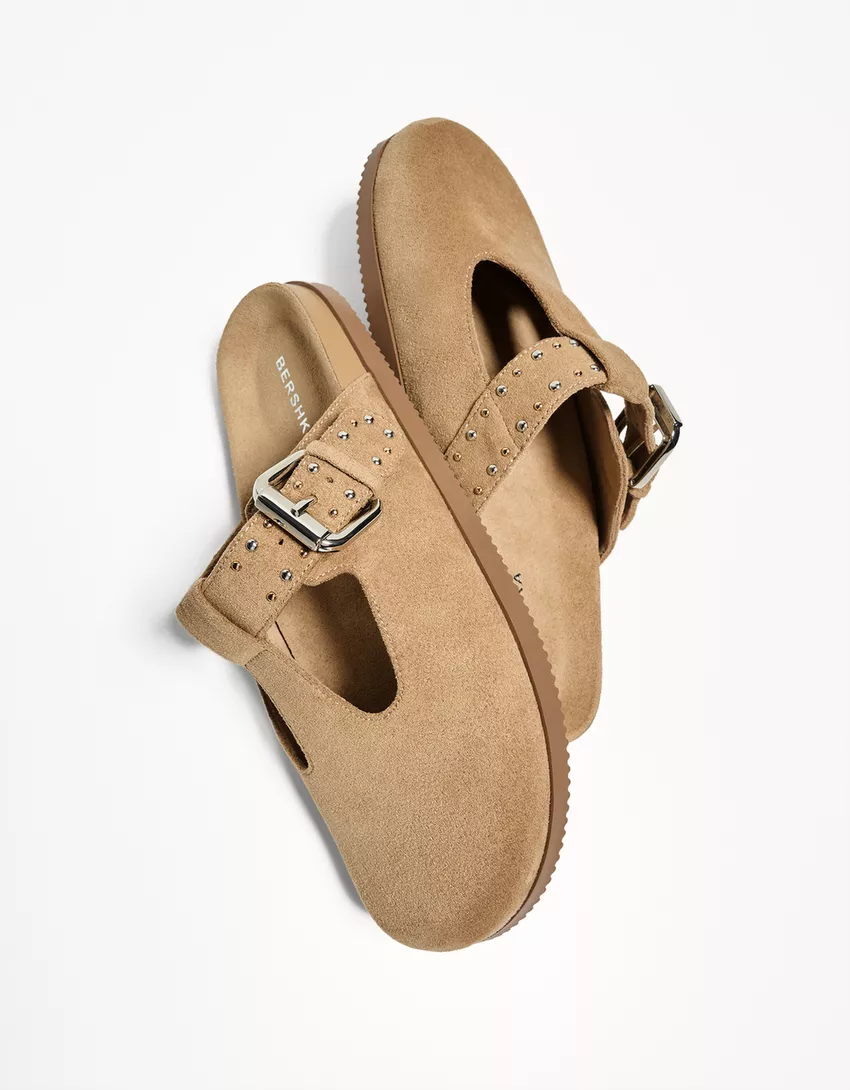 Clogs with buckle detail