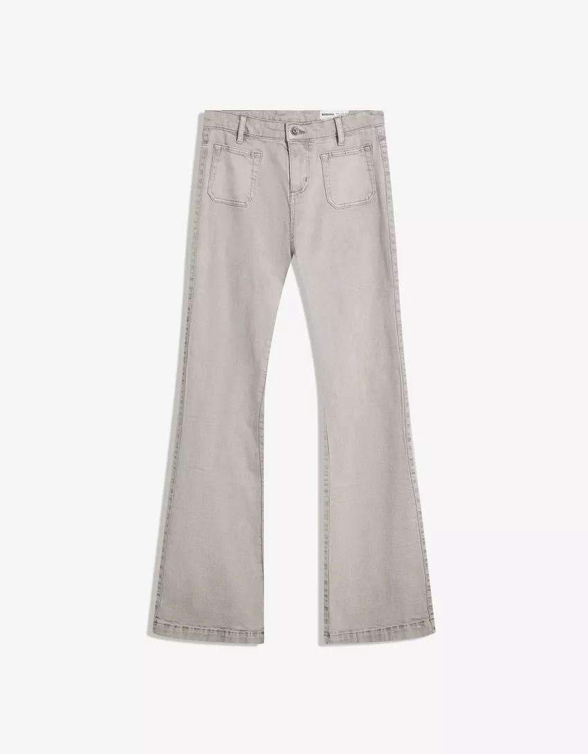 Flared pants with pocket flaps