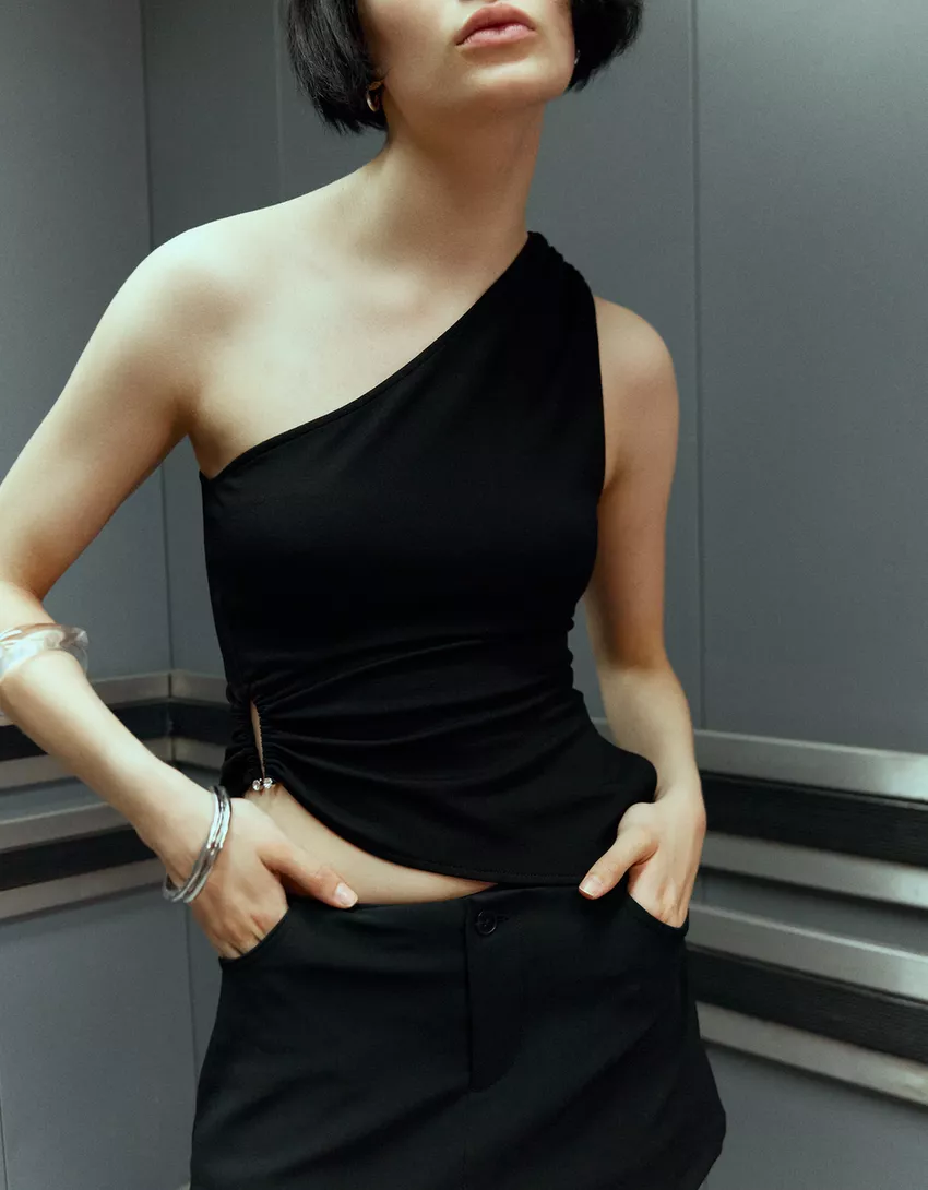 Asymmetric rhinestone top with ring detail