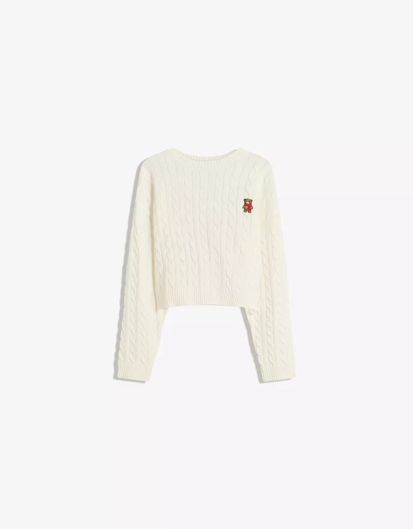 Cable-knit sweater with embroidery