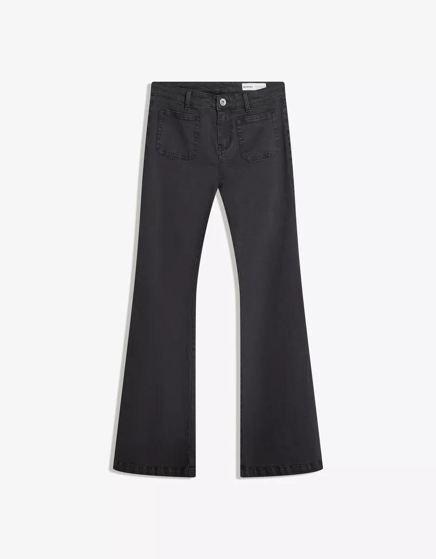 Flared pants with pocket flaps