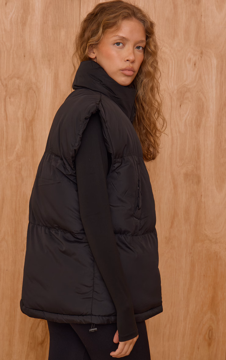 Black Extended Shoulder Sleeveless Puffer Vest