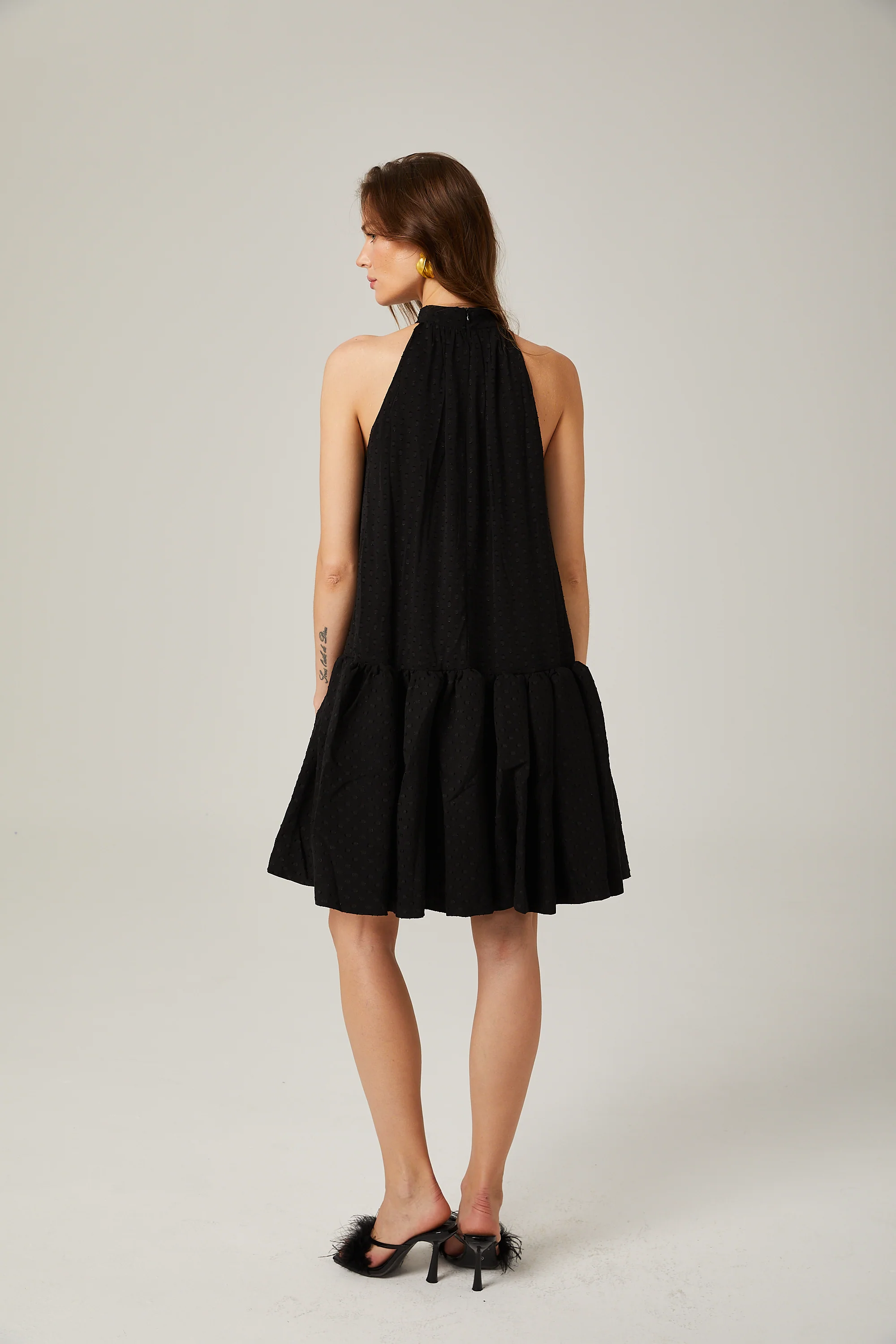 Aniya black polka-dot halterneck mini dress