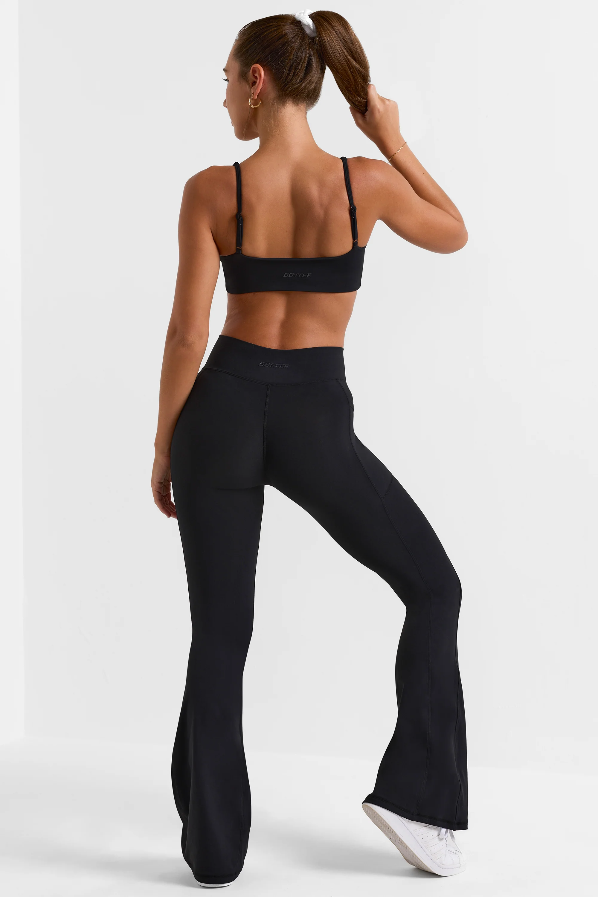 Petite Soft Active Crossover Flared Trousers in Black