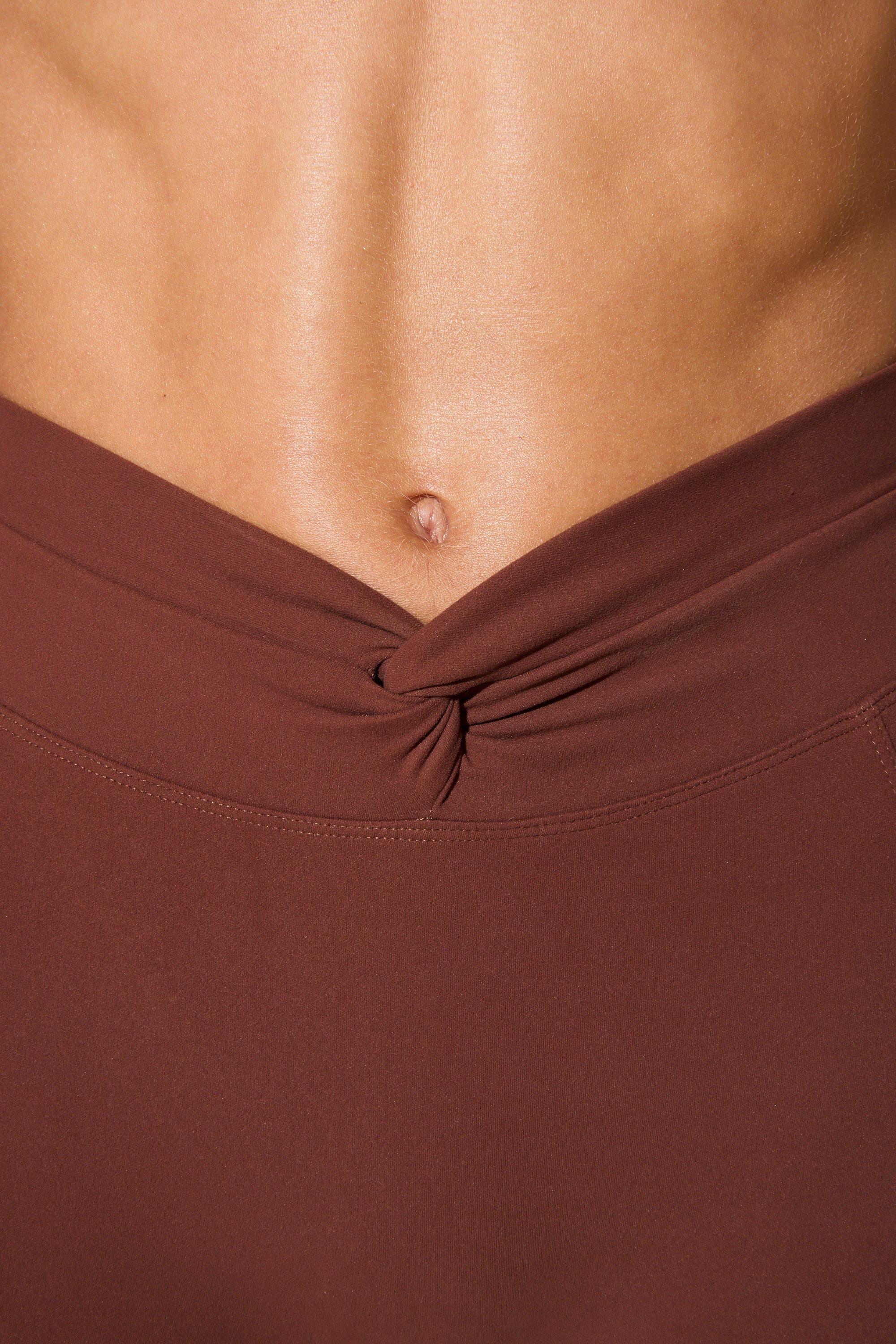 Realign - Twist Waist Flare Leggings in Chocolate