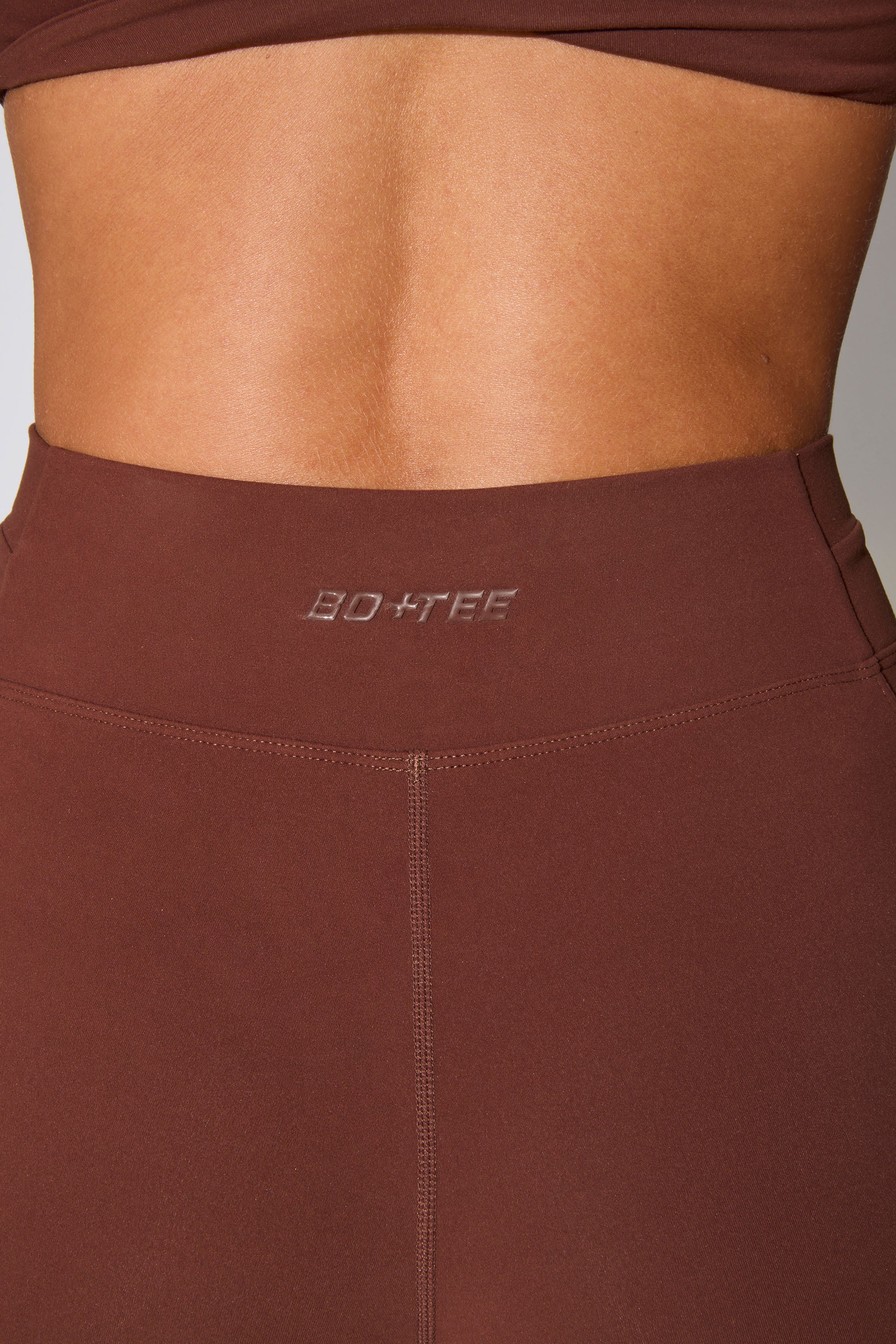 Realign - Twist Waist Flare Leggings in Chocolate