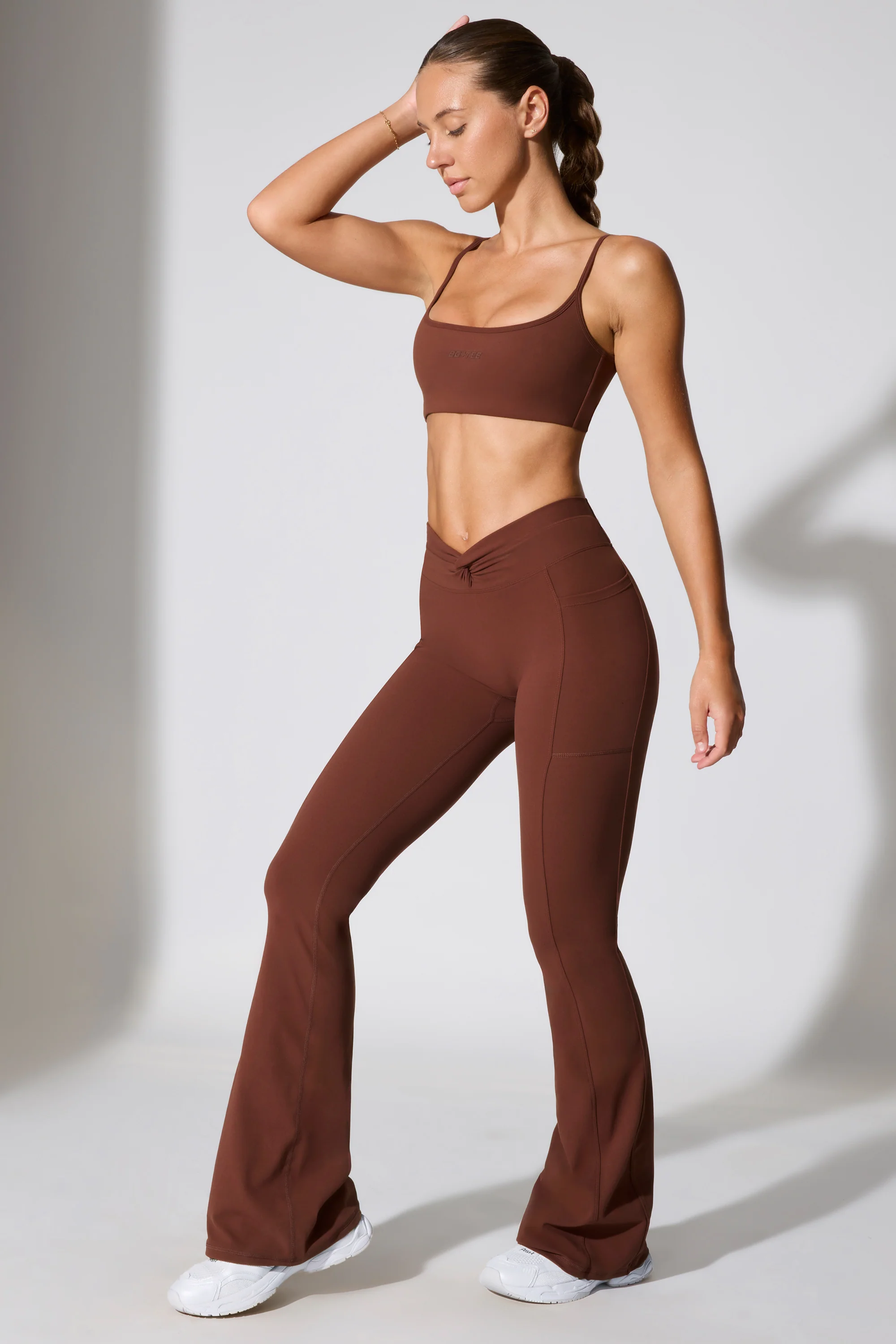 Realign - Twist Waist Flare Leggings in Chocolate