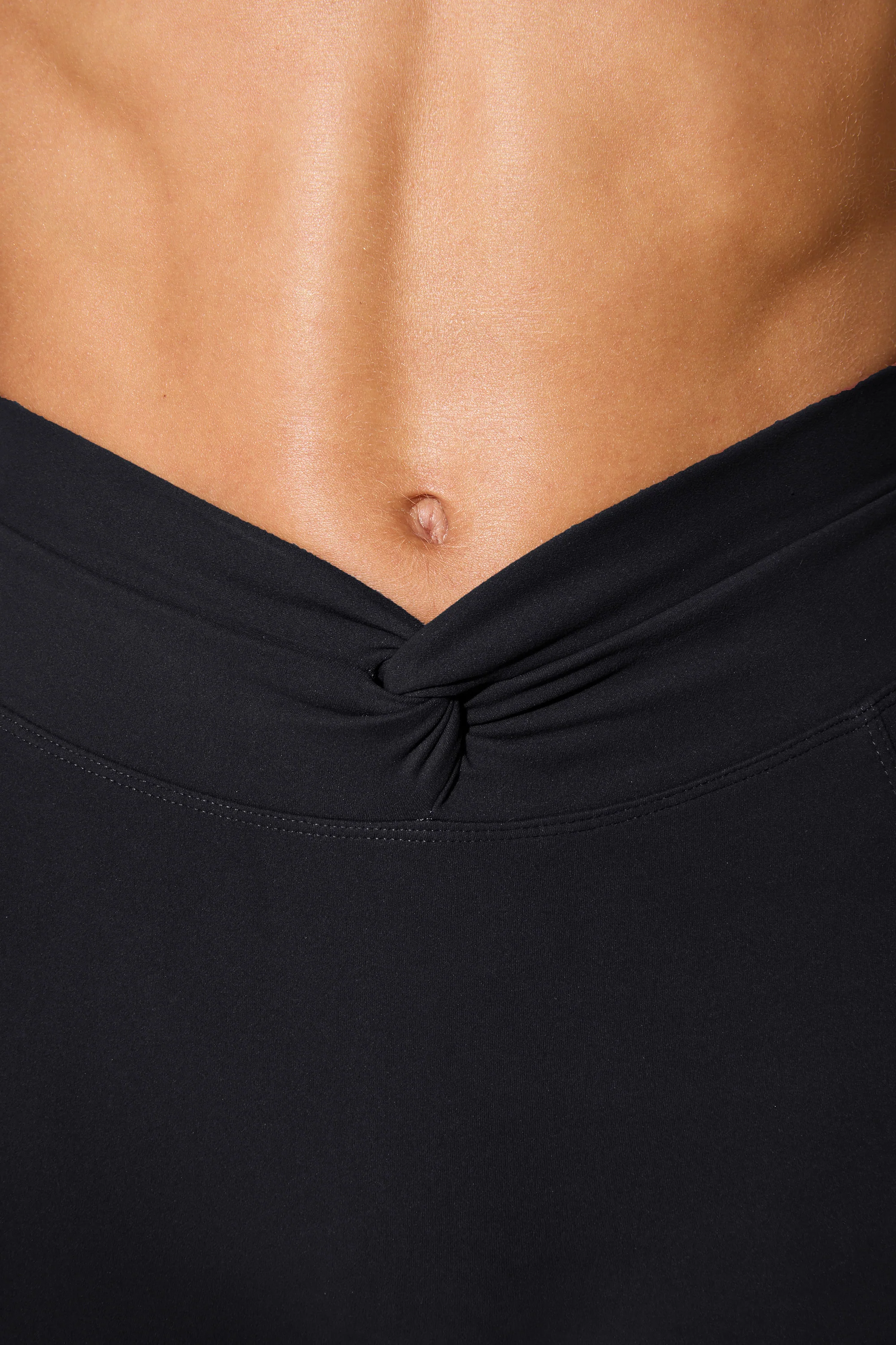 Realign - Twist Waist Flare Leggings in Black