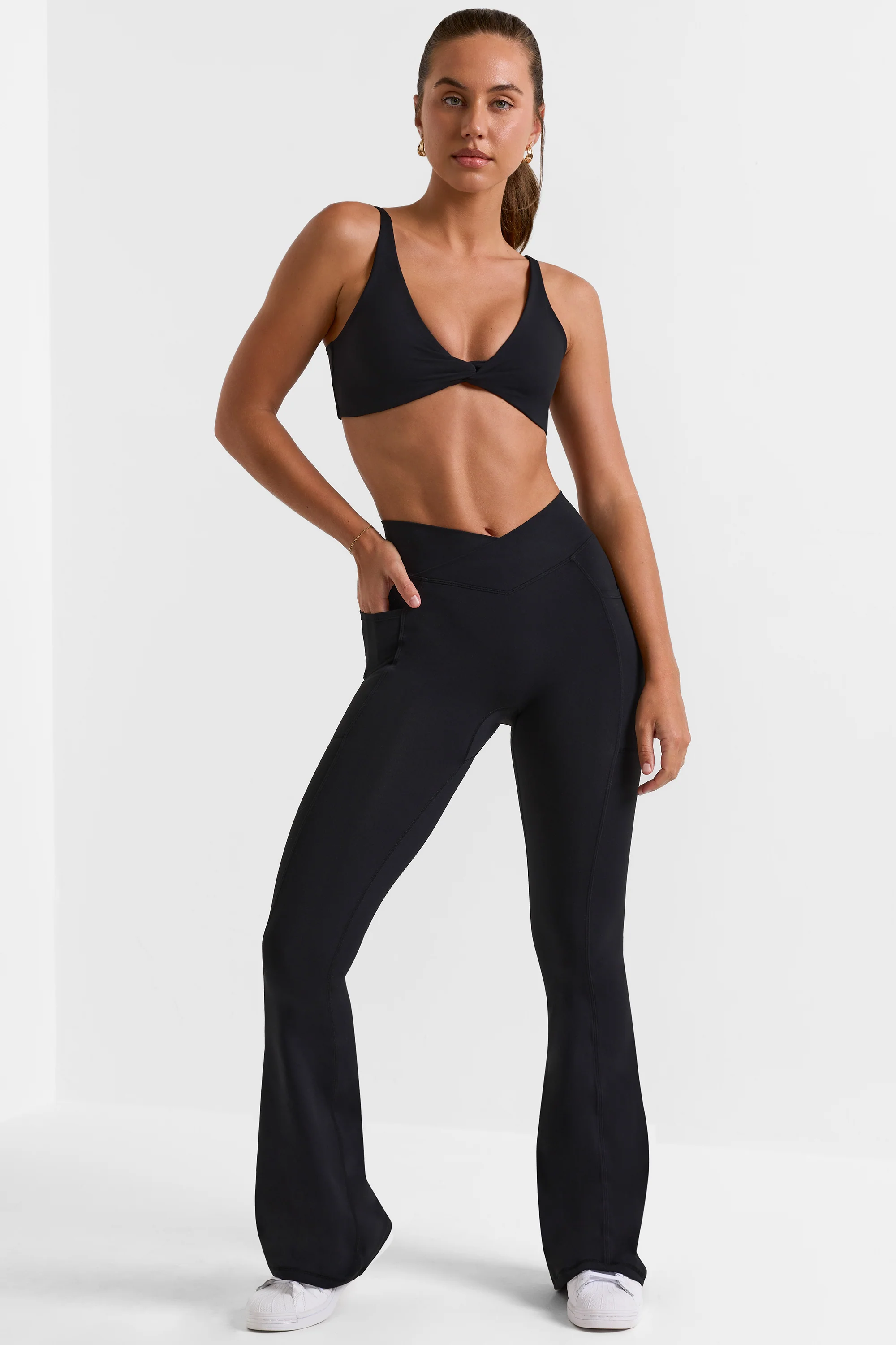 Petite Soft Active Crossover Flared Trousers in Black