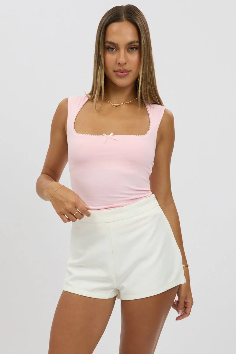 Pink Sleeveless Top With Trims And Bow
