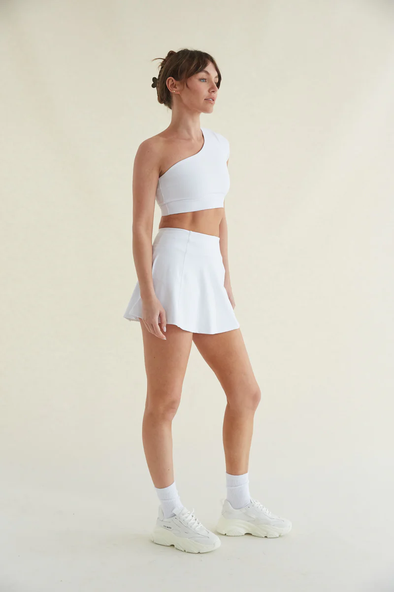 Avery Smoothing Flare Tennis Skort in White